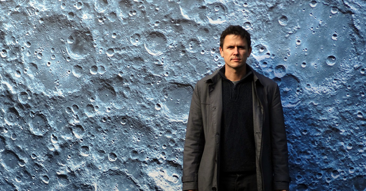 UK artist luke Jerram with his moon artwork